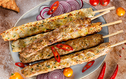 Lyulya-kebab from veal and pork